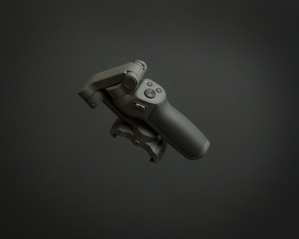 mobile gimbal floating on grey background