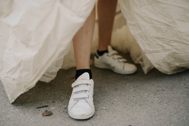 modern bride in dress and sneakers