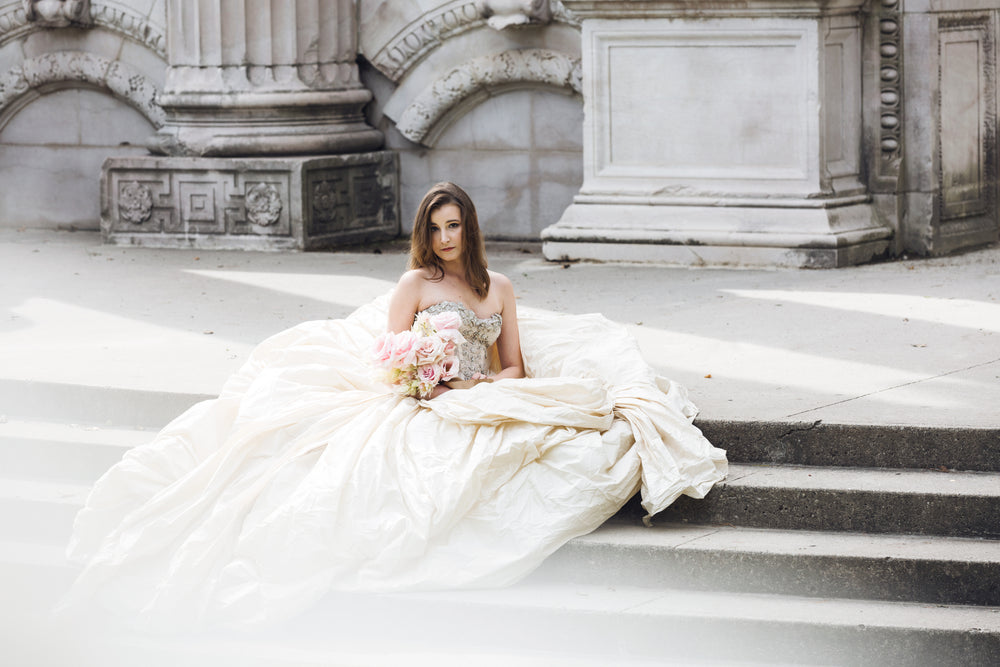 modern bride sitting on steps