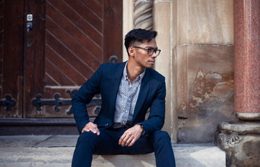 modern man in suit and glasses