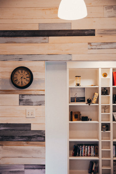 modern wood panelled wall and shelving interior