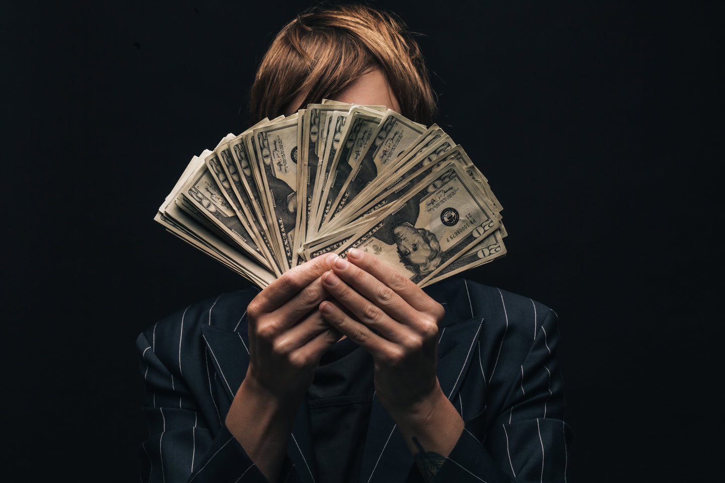 Money Hides Face