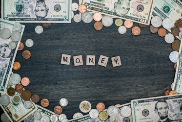 money letter tiles and coin