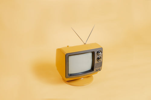 monochromatic vintage tv on simple background