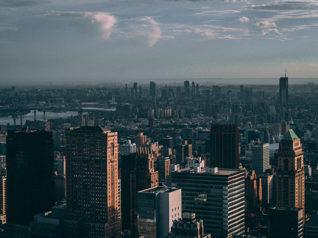 A moody view of the New York skyline under cloud