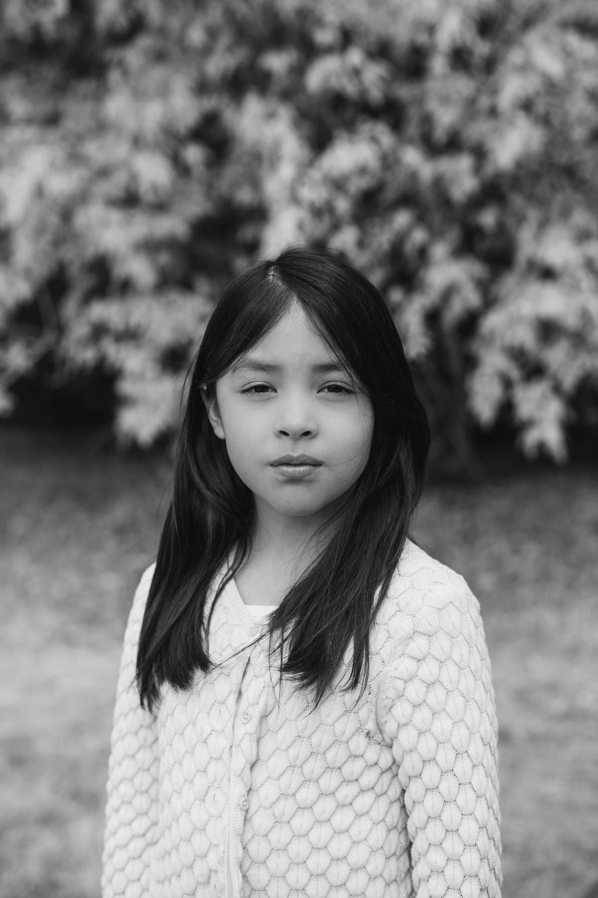 moody portrait of a child in black and white