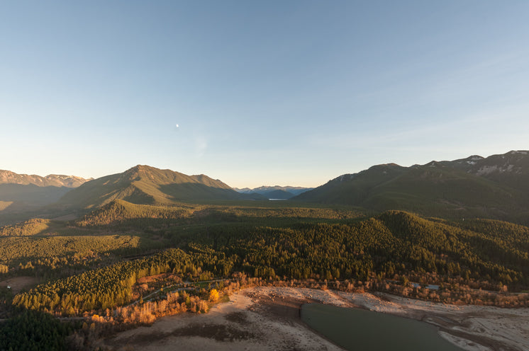 Moon Rises Over Mountains