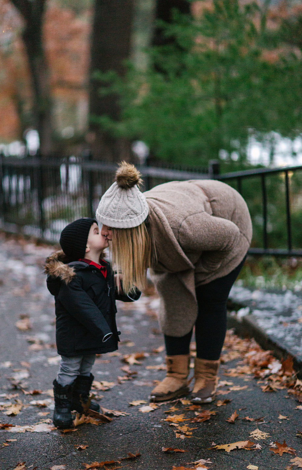 mother and son share a kiss