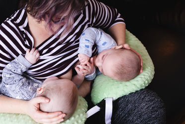 mother nurses twins