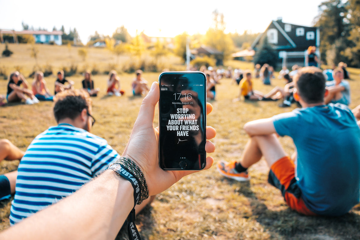 motivational message on mobile at outdoor event