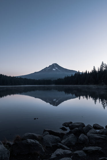 mount hood with calm lake reflection