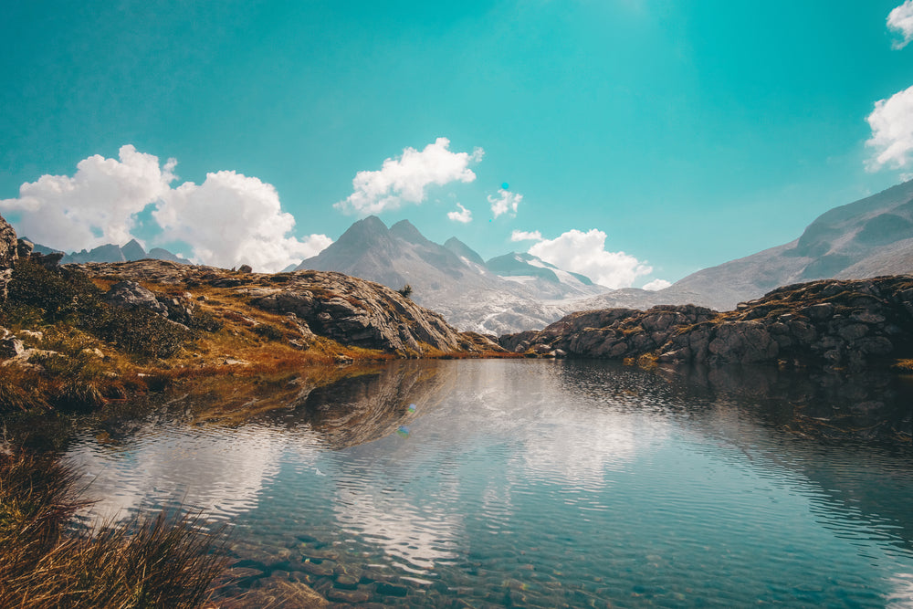 mountains and crystal clear water