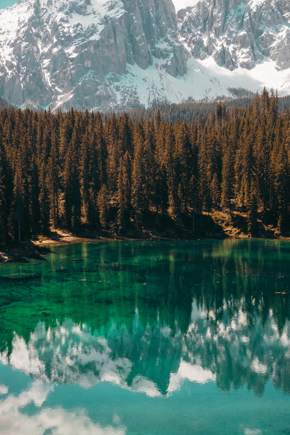 mountains reflecting in lake