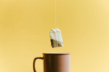mug with a fresh tea bag above it