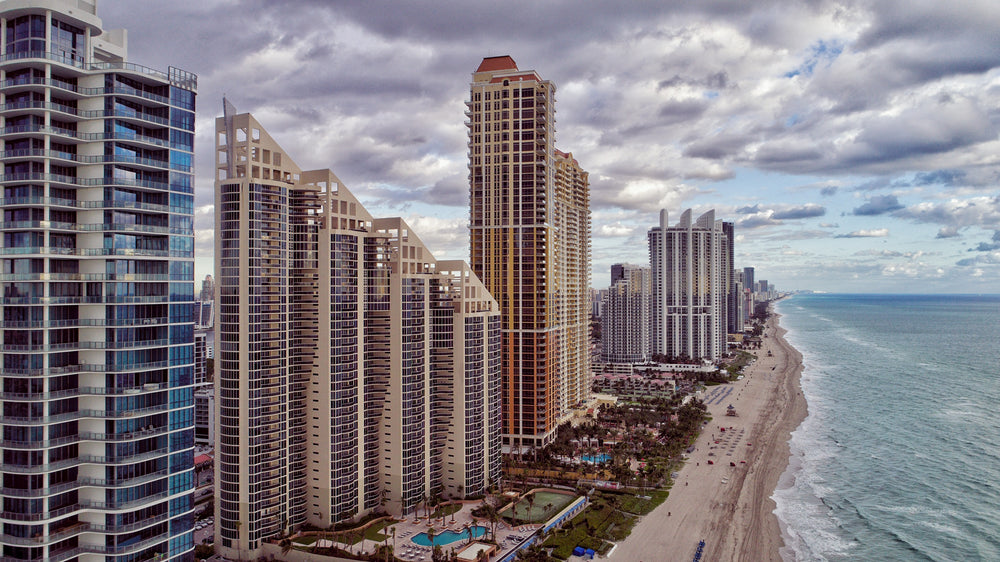 multi-story buildings stretch along the seafront