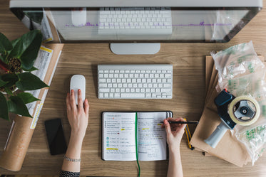 Picture of Multitasking At Desk - Free Stock Photo