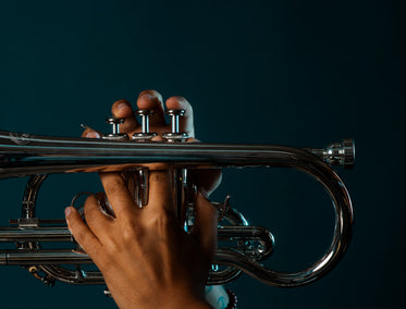 musician playing silver cornet