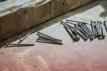 nails in sawdust