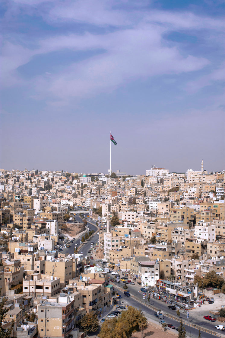 National Flag Of Jordan Over City Of Jerash