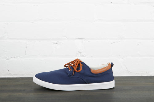 navy blue and white left shoe