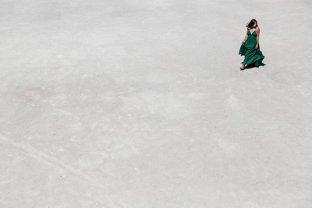 negative space woman in green dress