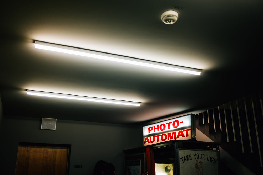 neon sign of a photo booth