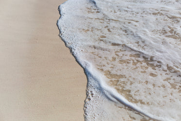 ocean water on beach sand