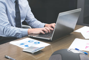 Browse Free HD Images of Office Staff Typing On Laptop