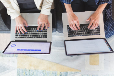 office women on laptop computers