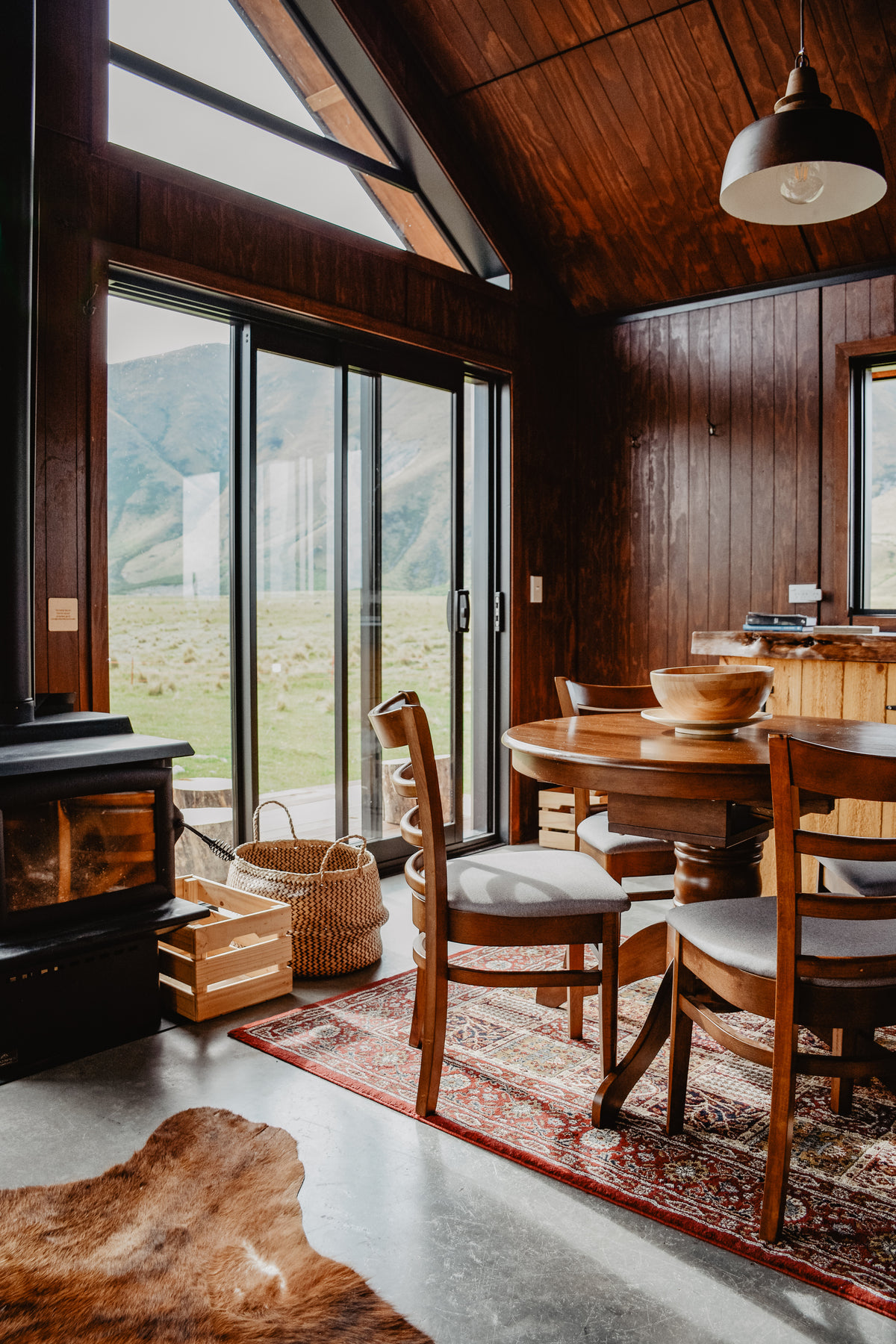 open door in dining area of cabin