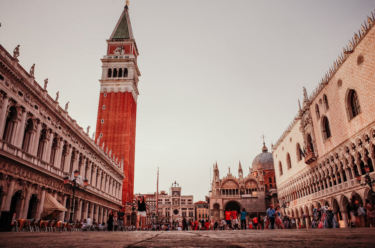 open-town-square-with-people-walking-aro