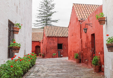 orange buildings with a terracotta roof