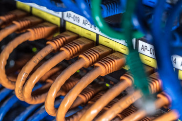 orange computer cables plugged in