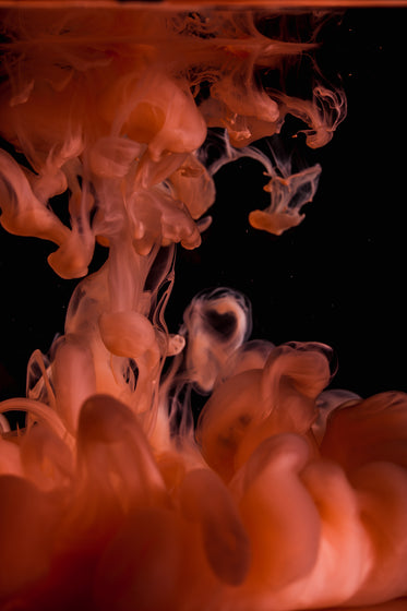 orange ink in water