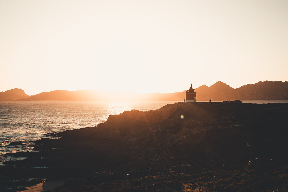 orange sunset over coastline