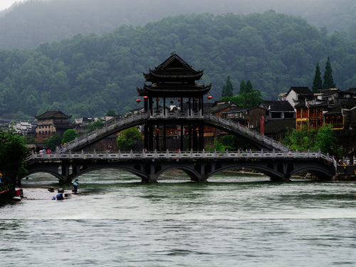 Oriental Bridge Beneath Mountains