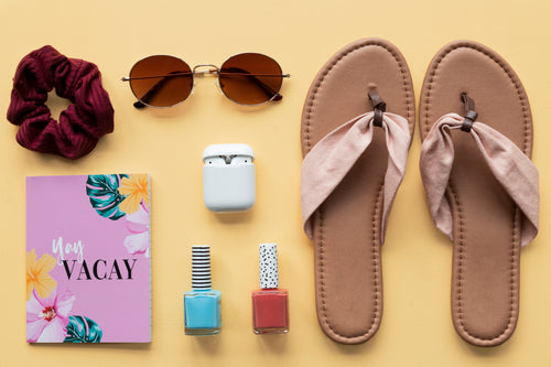 packing sunglasses and cosmetics for a holiday