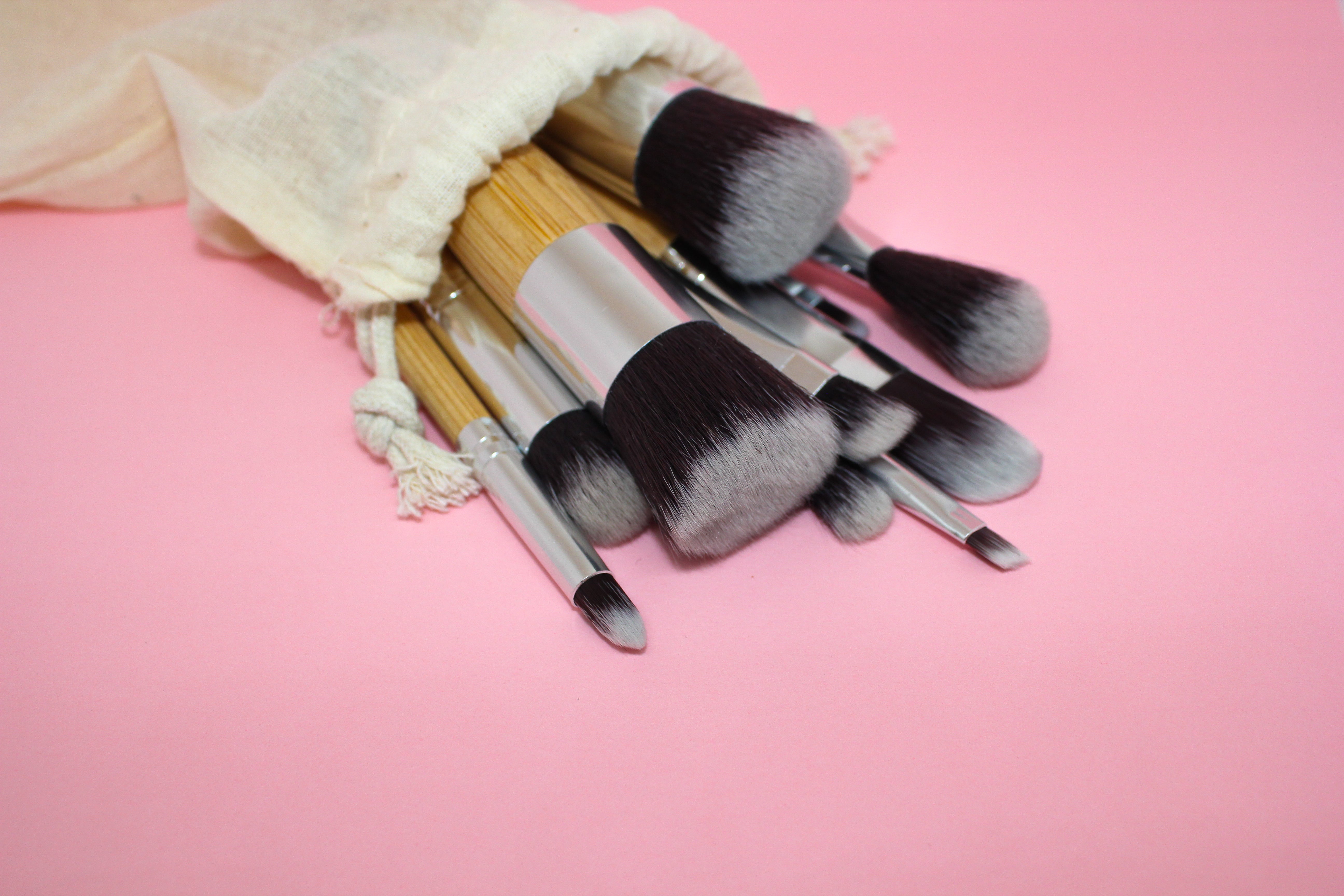 Premium Photo  Painting brushes on the pink table