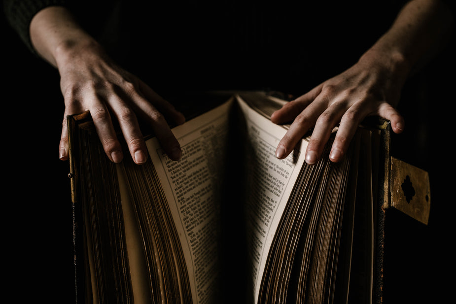 High Res Pair Of Hands Hold A Big Book Picture — Free Images