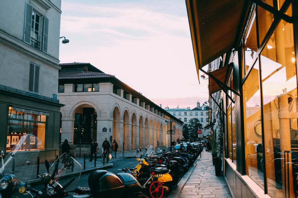 parked mopeds on a parisian street