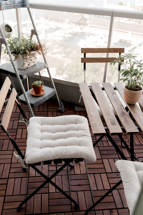 patio chairs and white cushions