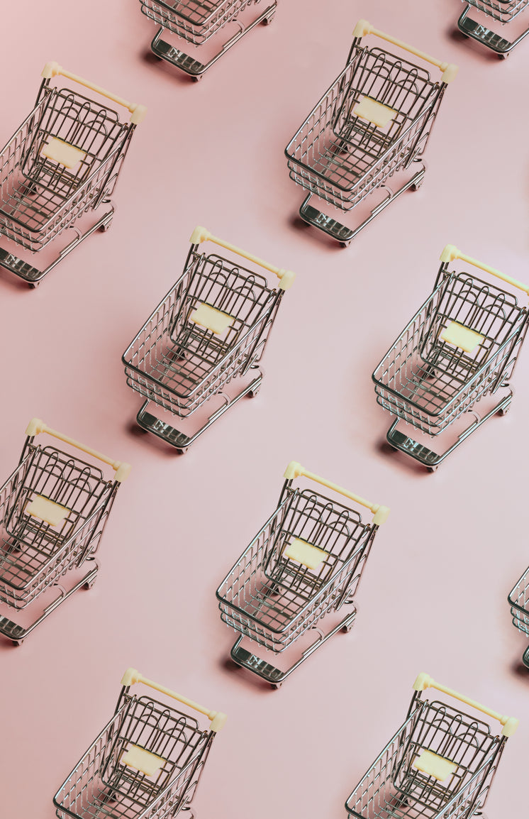 pattern-of-silver-shopping-carts-on-a-pink-background.jpg?width=746&format=pjpg&exif=0&iptc=0