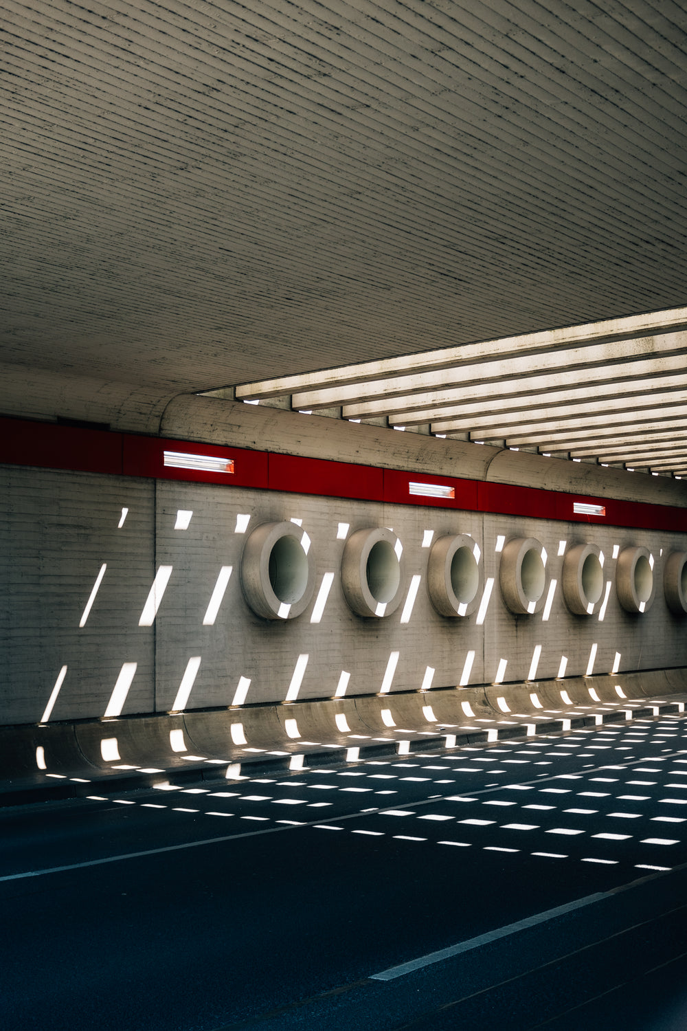 patterned tunnels on the concrete wall