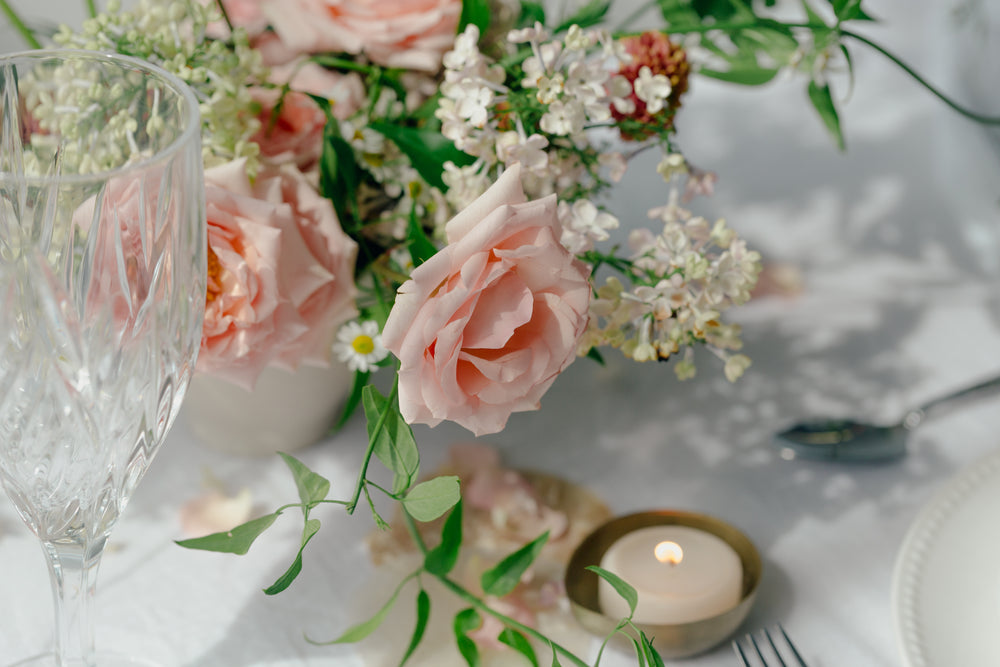 peach roses on table