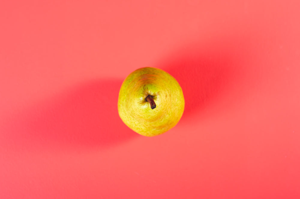 pear from above on pink