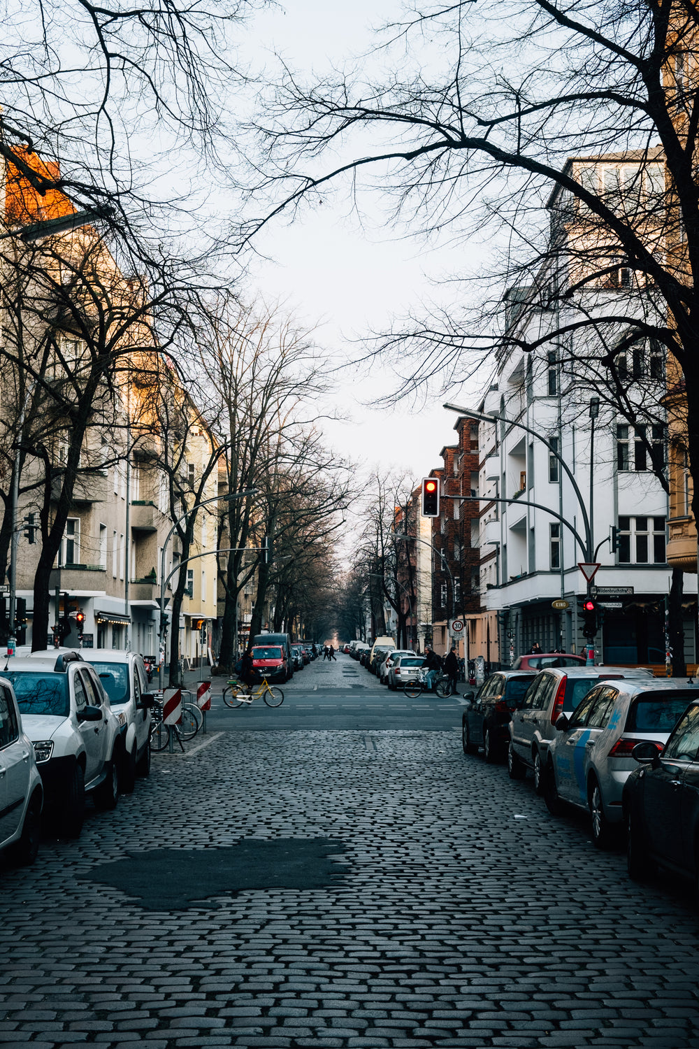 pedestrians on cobblestone european streets