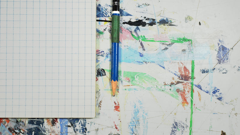 Pencil And Grid Paper