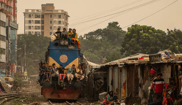 people finding a seat on a passing train