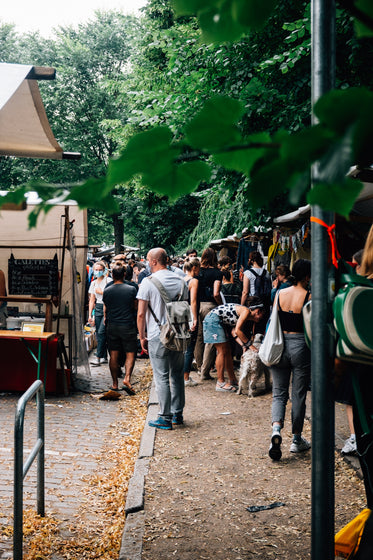 people in a busy farmers market