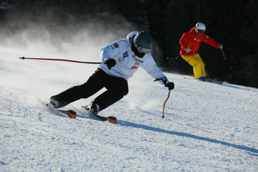 Person Cuts Through The Snow On Skis